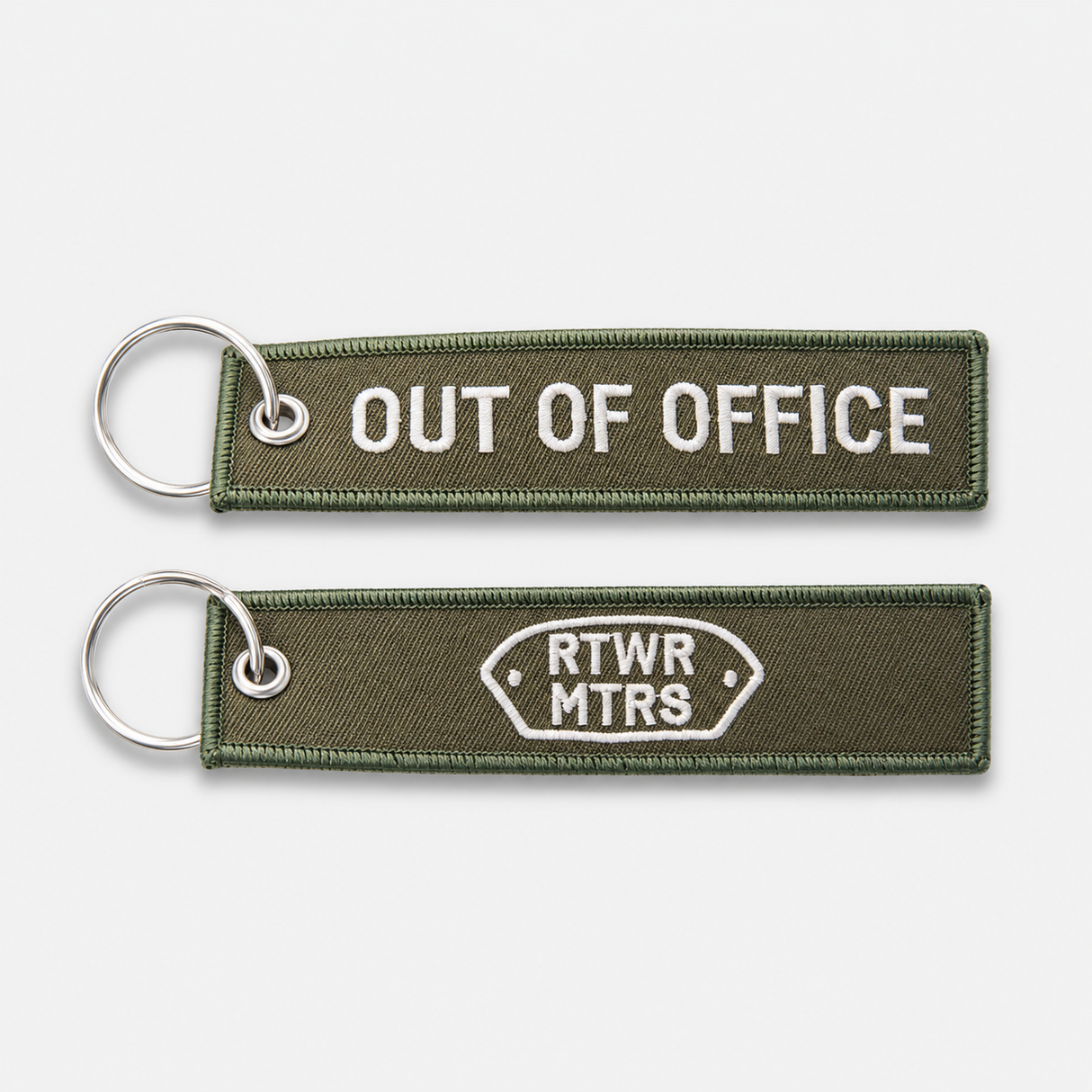 RTWR MTRS Out of Office woven keychain on neutral background, front and logo side