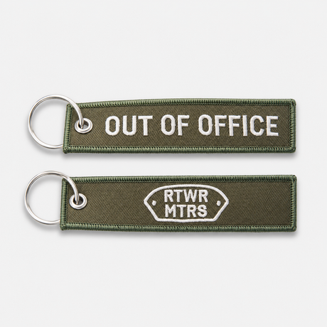 RTWR MTRS Out of Office woven keychain on neutral background, front and logo side