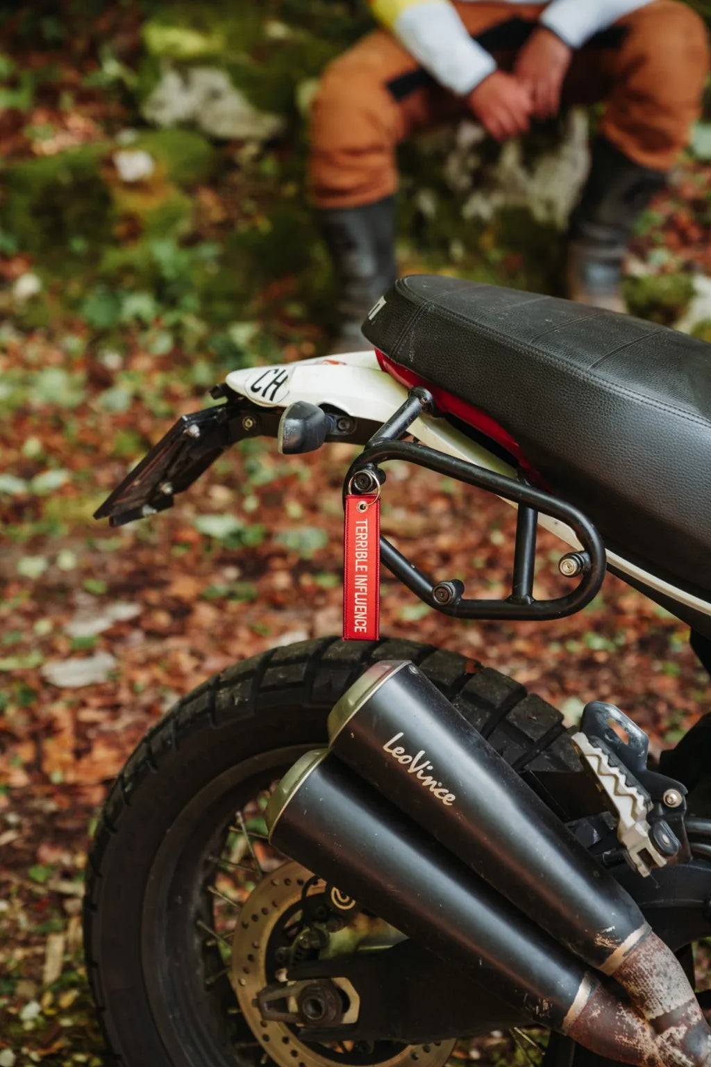 Rottweiler Motors Terrible Influence woven keychain on motorcycle