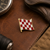 Stage One Pin in a vintage motorcycle-inspired leather flat lay